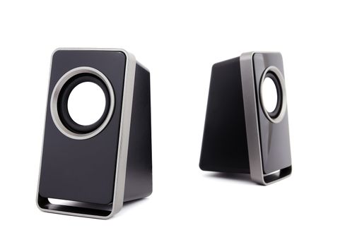 two computer speakers on a white background