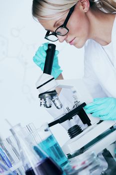  two scientist in chemical lab conducting experiments