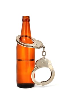 handcuffs and  bottle on a white background