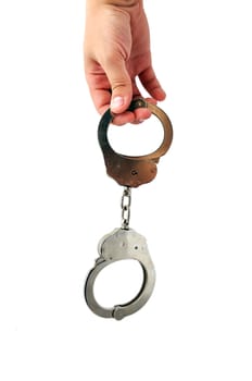 Handcuffs and hand  on a white background