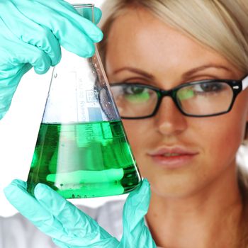 Woman  conducting a chemical experiment