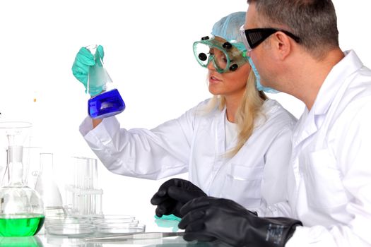  researchers holding a secret green chemical substance