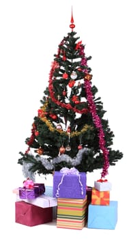 IMage of a decorated Christmas tree and many gift boxes isolated against a white background.