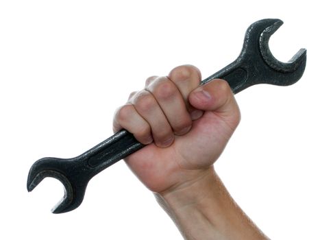 Repairing work spanner wrench tool in human hand 