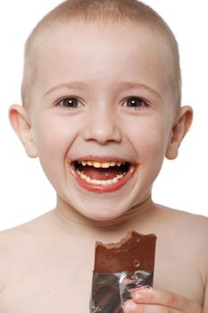 Little child holding sweet chocolate candy food