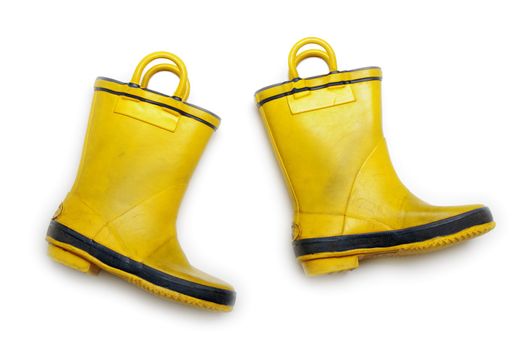 Rain shoe - yellow rubber waterproof boot on white