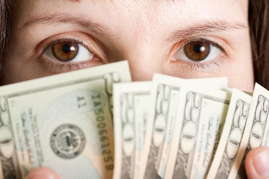 Finance businesswomen hand holding dollar currency