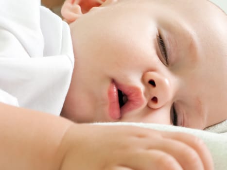 Little child sleeping in happiness and family love