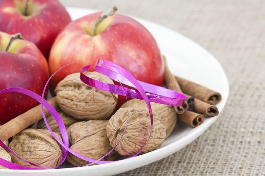 apples, walnuts and cinnamon sticks