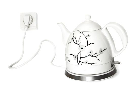 Porcelain electric teapot - it is isolated on a white background