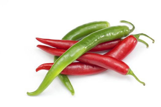 Red hot chili peppers on white background