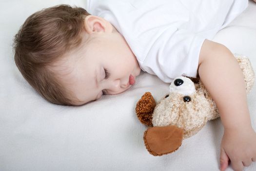 Little child sleeping in happiness and family love