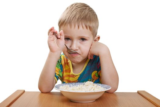 Little cute child eating food in family care