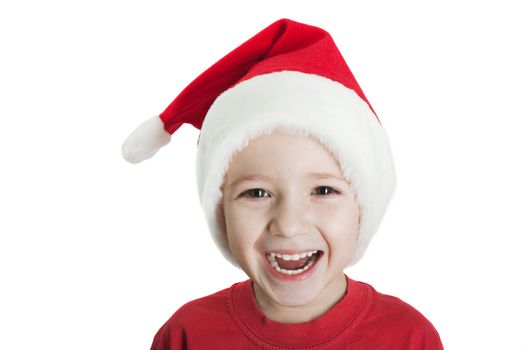 Little child in christmas holiday red Santa hat
