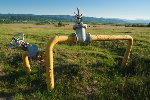 Yellow gas blow with cranes