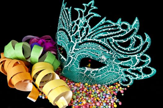 Carnival masks on black velvet background