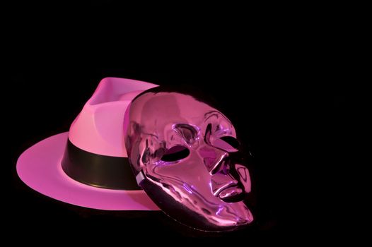 Carnival masks on black velvet background