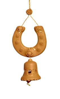 ceramic souvenir  horseshoe with bell on white