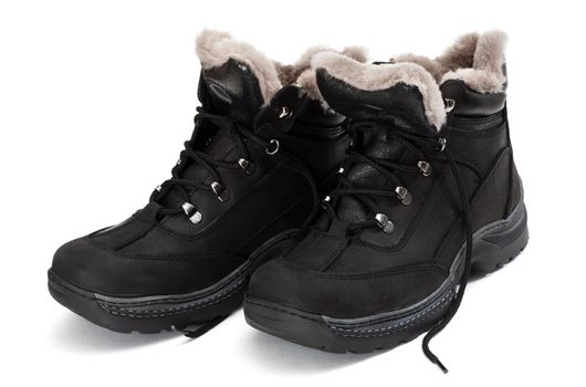 Black winter man's boots on a white background