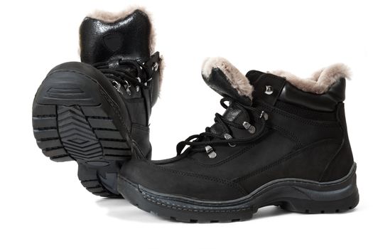 Black winter man's boots on a white background