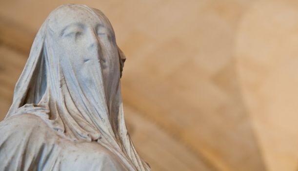 Lady with a veil: classical example of funeral art