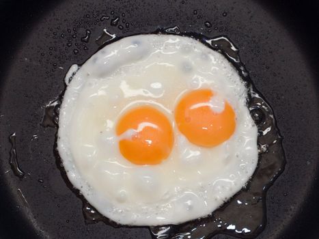 Cooked fried egg food for eating at breakfast meal