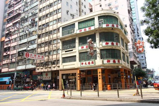 HONG KONG - MAR 12, A busy street with old apartment blocks in Wai Chai, Hong Kong on 21 March, 2011. 