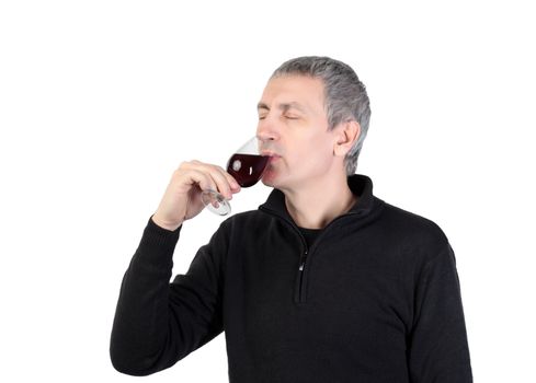 Man tries a glass of red port wine, on white background