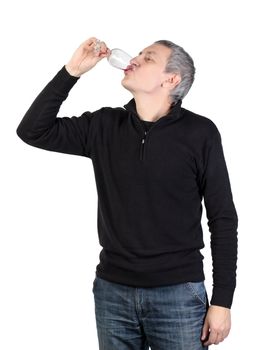 Man drink a glass of red port wine, on white background