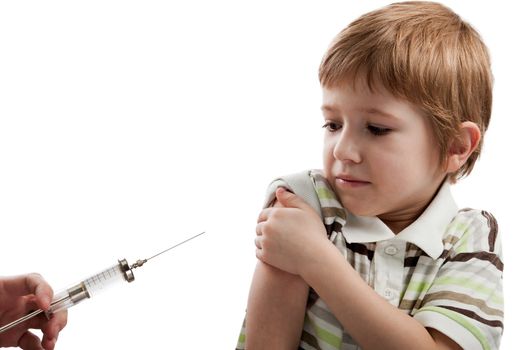Medicine healthcare syringe injecting scared child