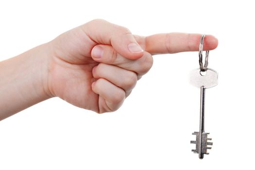 Human hand holding steel metal house door lock key