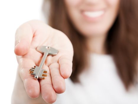 Beauty smiling female human hand holding house key
