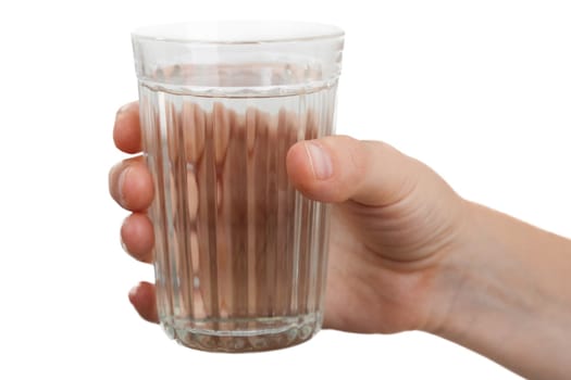 Female human hand holding liquid drink water glass