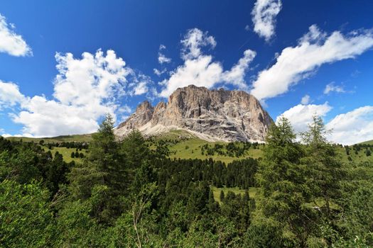 summer view of Sassolungo mount from Gardena valley, Italian Dolomites