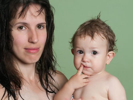 Smiling mother and little child - family happiness