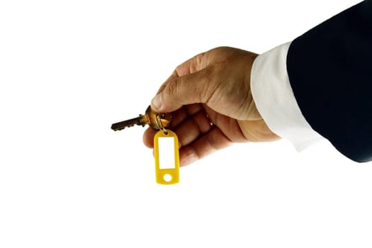 Hand whith key  with blank tag on white background. Isolated object