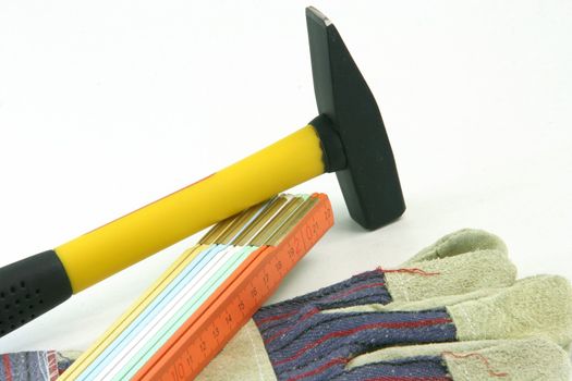 construction tools gloves hammer and meter detail  isolated in white background