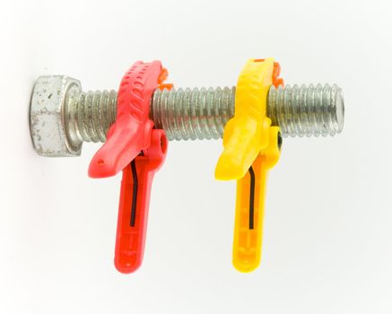 Screw and color clamps  on  white background. Isolated object.