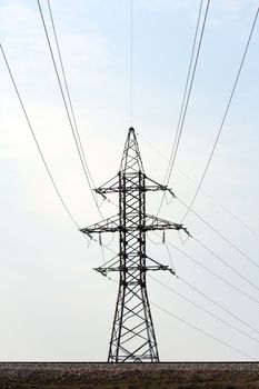 Blue sky power line cable electricity tower pylon