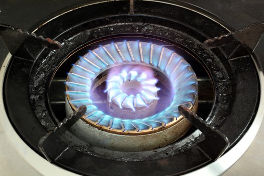 LPG Gas Burner hot blue fire flames from a stove for cooking in a kitchen