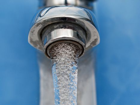 Clean sink and faucet at home toilet or bathroom