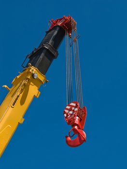 Building crane boom with steel hook