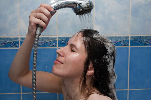 Beauty women take shower in bathroom for hair care