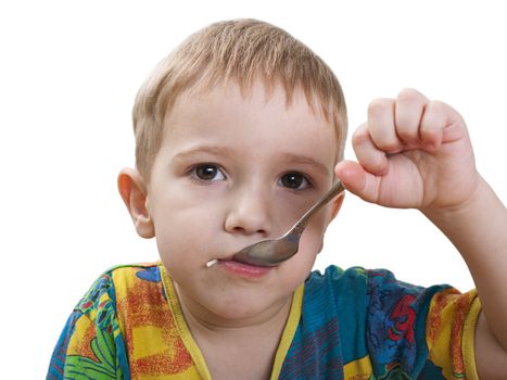 Little cute child eating food in family care