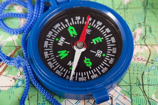 Travel north direction compass on cartography map