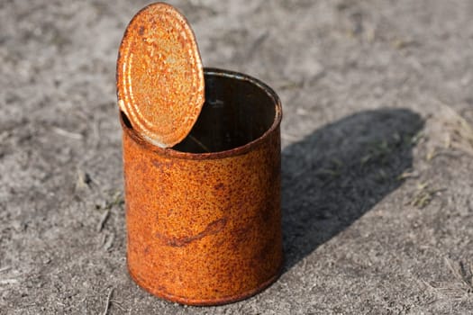 Empty rusty preserved food metal tin container can