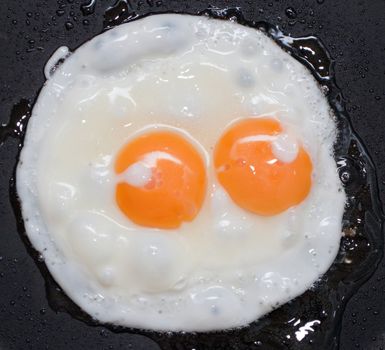 Cooked fried egg food for eating at breakfast meal