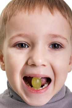 Little child eating healthy lifestyle grape fruit