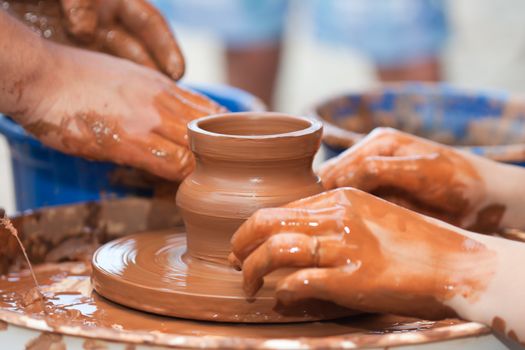 Pottery craft wheel ceramic clay potter human hand