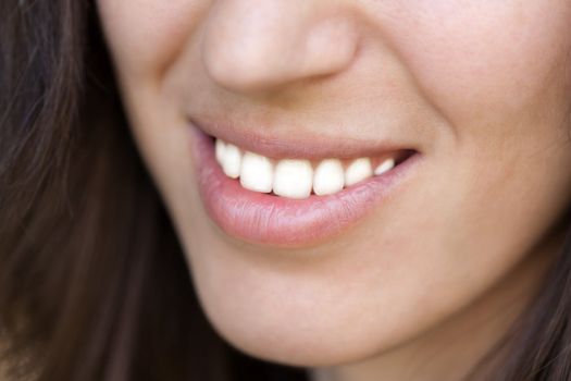 Smiling women - human female beauty teeth and lips